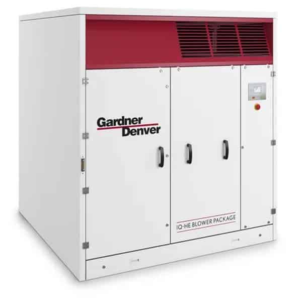A large white industrial machine labeled Gardner Denver with a red top section, three front doors, ventilation slats, control panel, and the text IQ-HE Blower Package on the lower right corner.