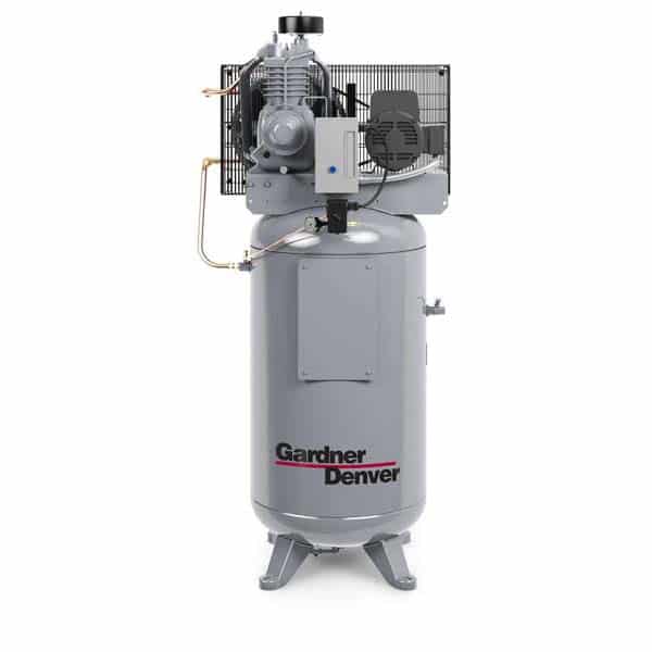 A gray vertical air compressor with exposed components and a control box labeled Gardner Denver stands on four legs against a white background.