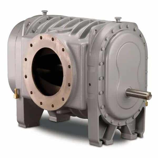 A large industrial gray metal blower housing with a round front opening, ribbed surface, side shaft, bolts, and mounting feet at the base.